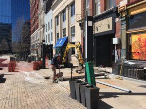 breaking ground to add new electric lines for Nate's Coffee Shop downtown Lexington Kentucky